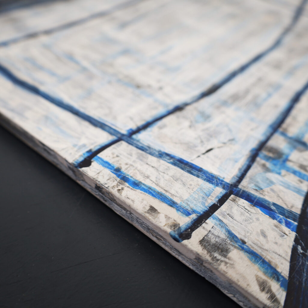 Side view of the abstract artwork 'Matrix Expansion' by Asahi Tanaka, revealing the thickness of the wood panel and the continuation of the painting onto the edges of the piece.